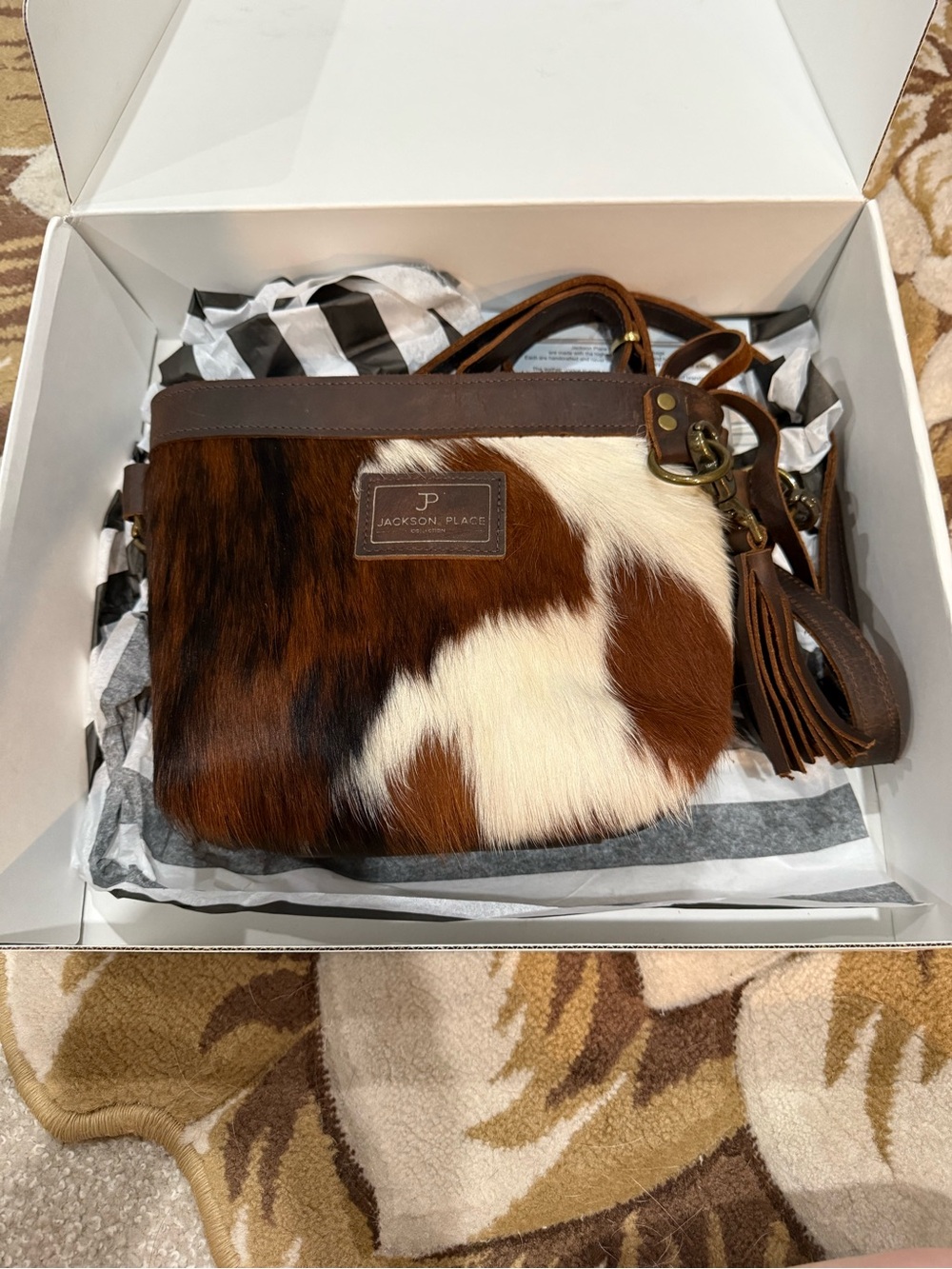 Jackson Place Collection brown and white hair-on-hide cowhide leather crossbody